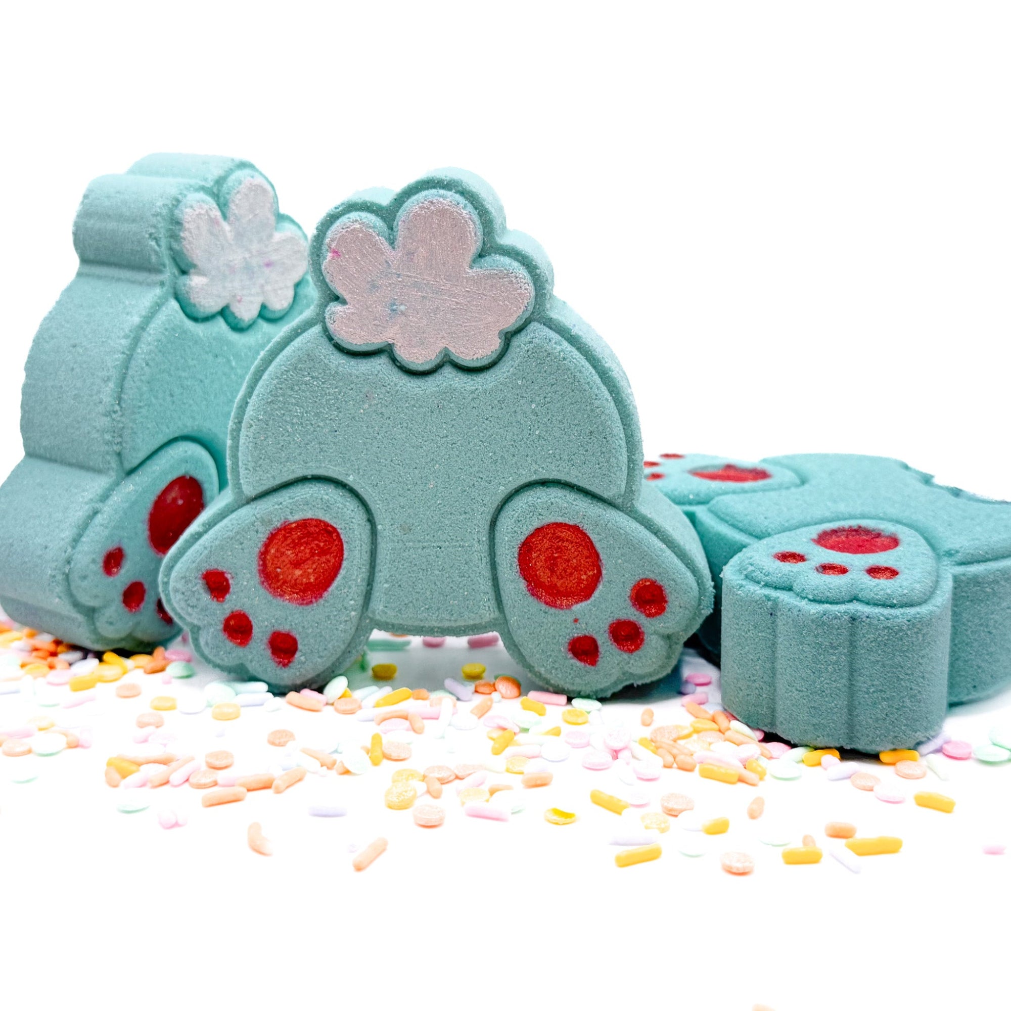 Teal bunny but bath bombs made by rusted acre soap company. Multiple views, front, sides.