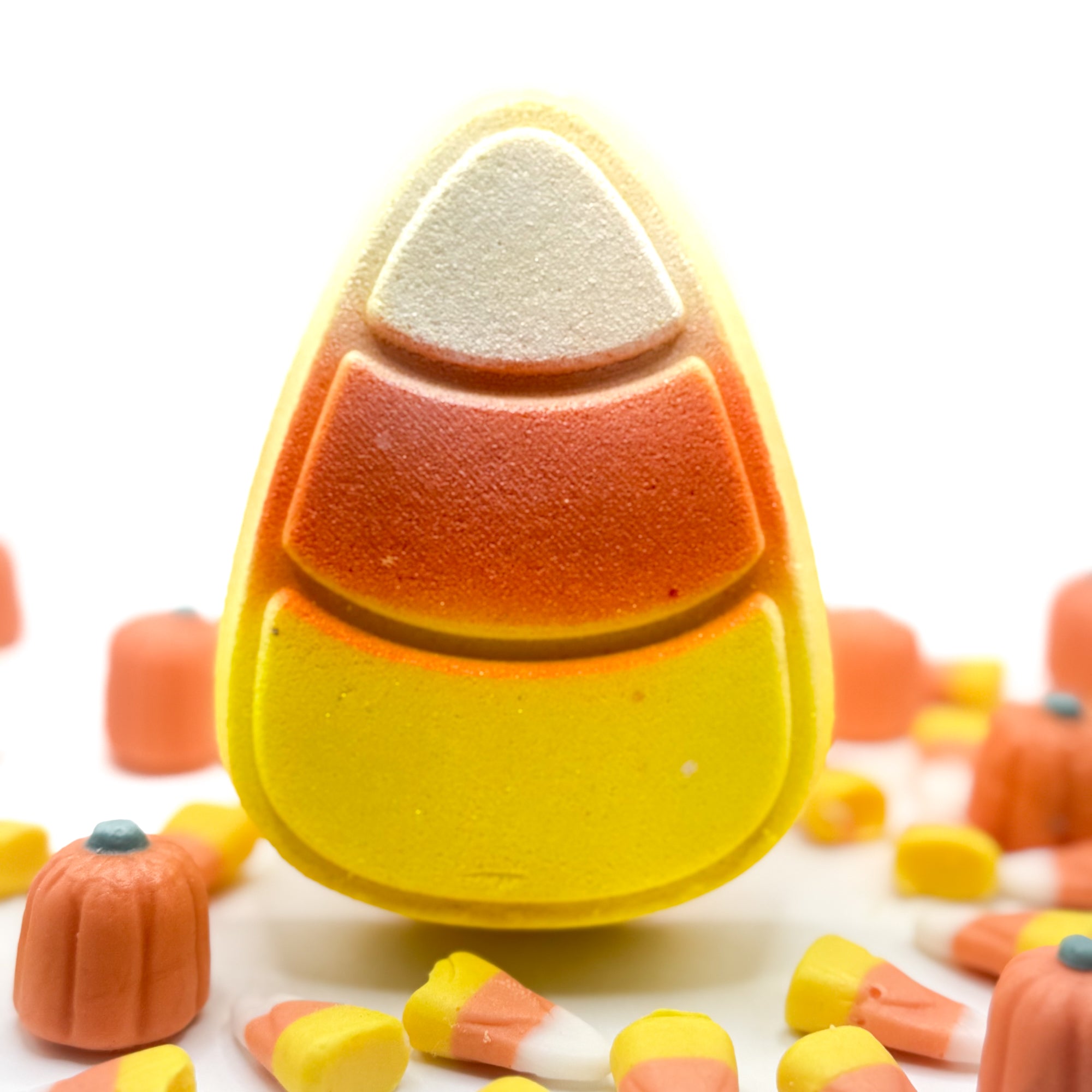 One candy corn shaped and scented bath bomb. Colors from the bottom up are yellow, orange, white/shimmer.