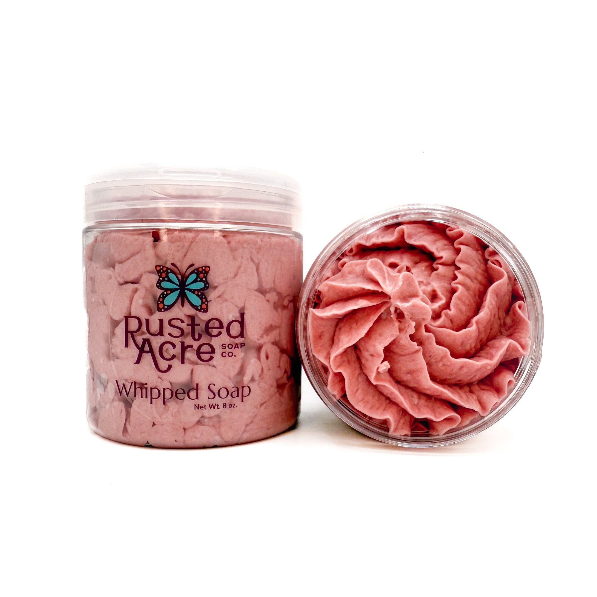Two jars of Rusted Acre Soap Company’s cherry almond whipped soap front and top view.