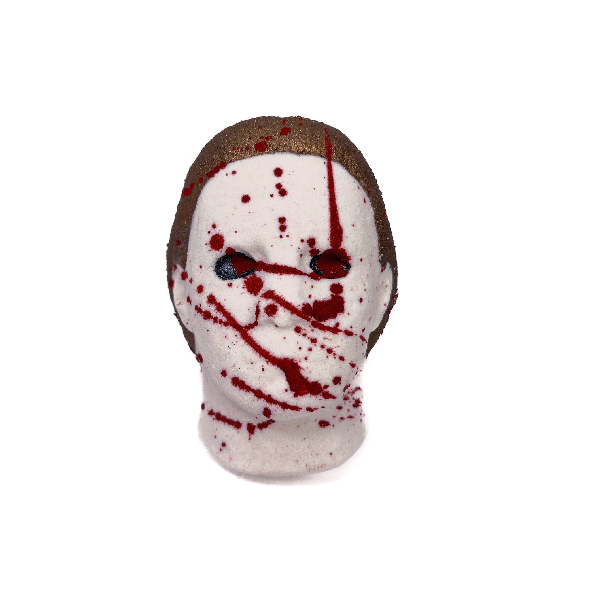 A bath bomb inspired by a horror movie hand-painted brown hair and black eyes then splatterd with red mica looking like blood!