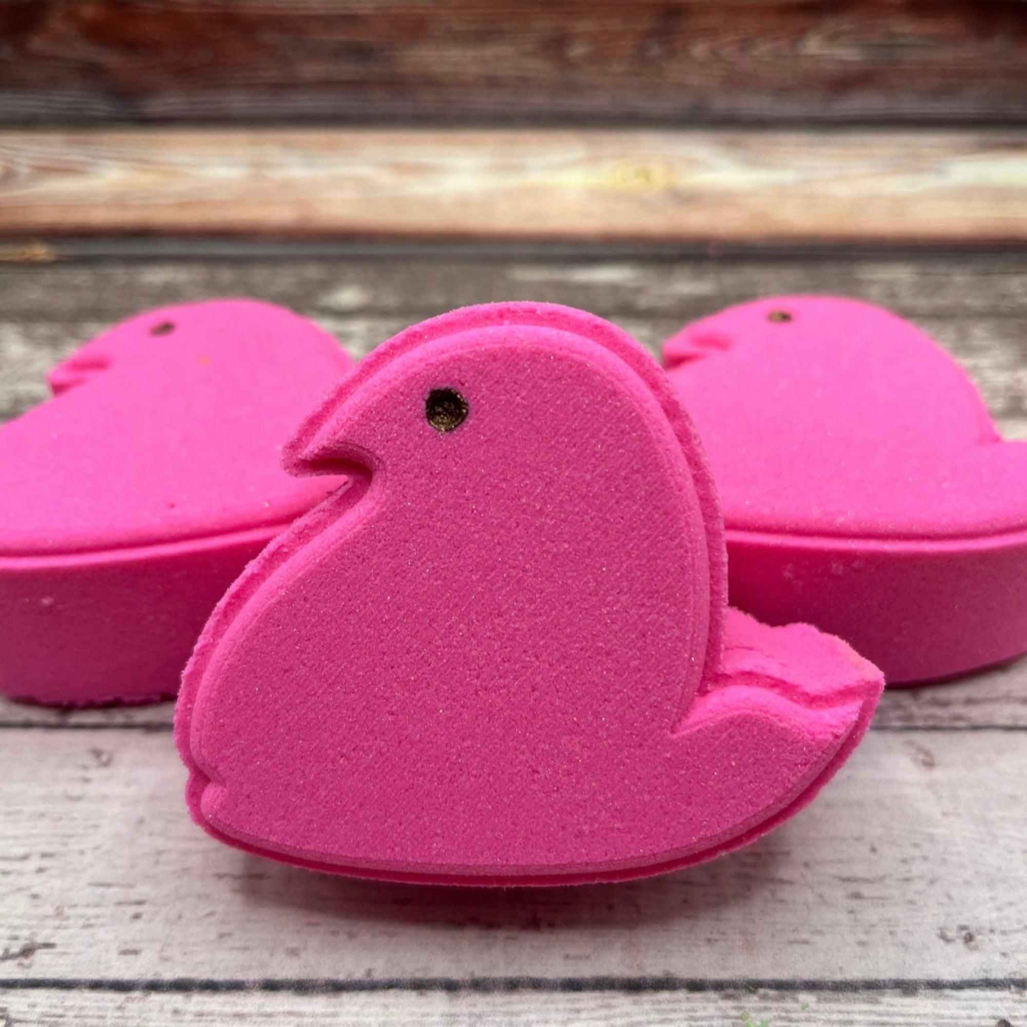 Pink marshmallow chick bath bomb made by rusted acre soap company.