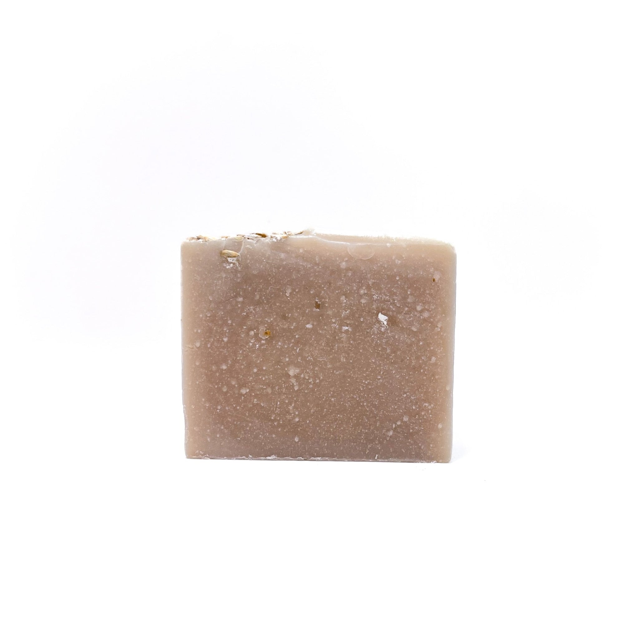 A natural colored oat milk and honey handmade soap from Rusted Acre Soap Co.