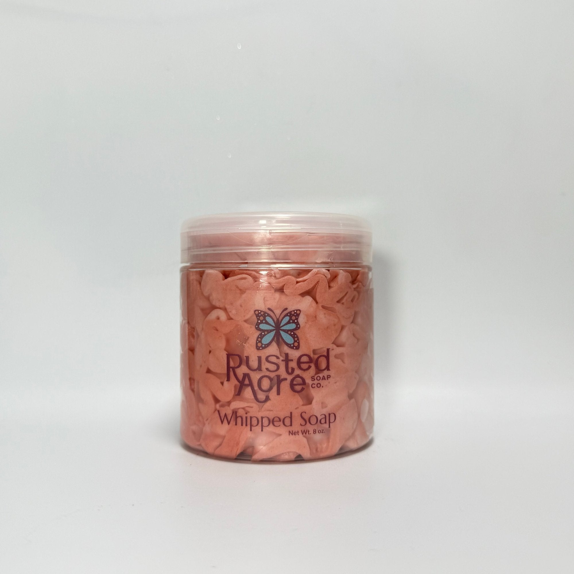 One jar of red peppermint scented whipped soap from Rusted Acre Soap Co.