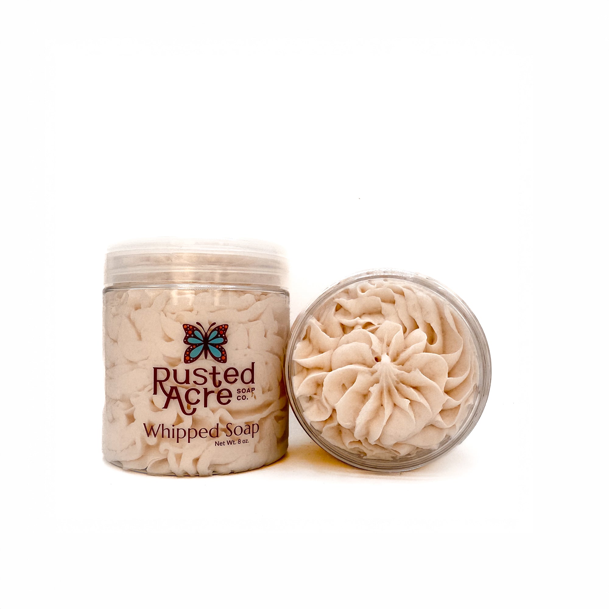 Two jars of Rusted Acre Soap Company’s vanilla bean whipped soap front and top view.
