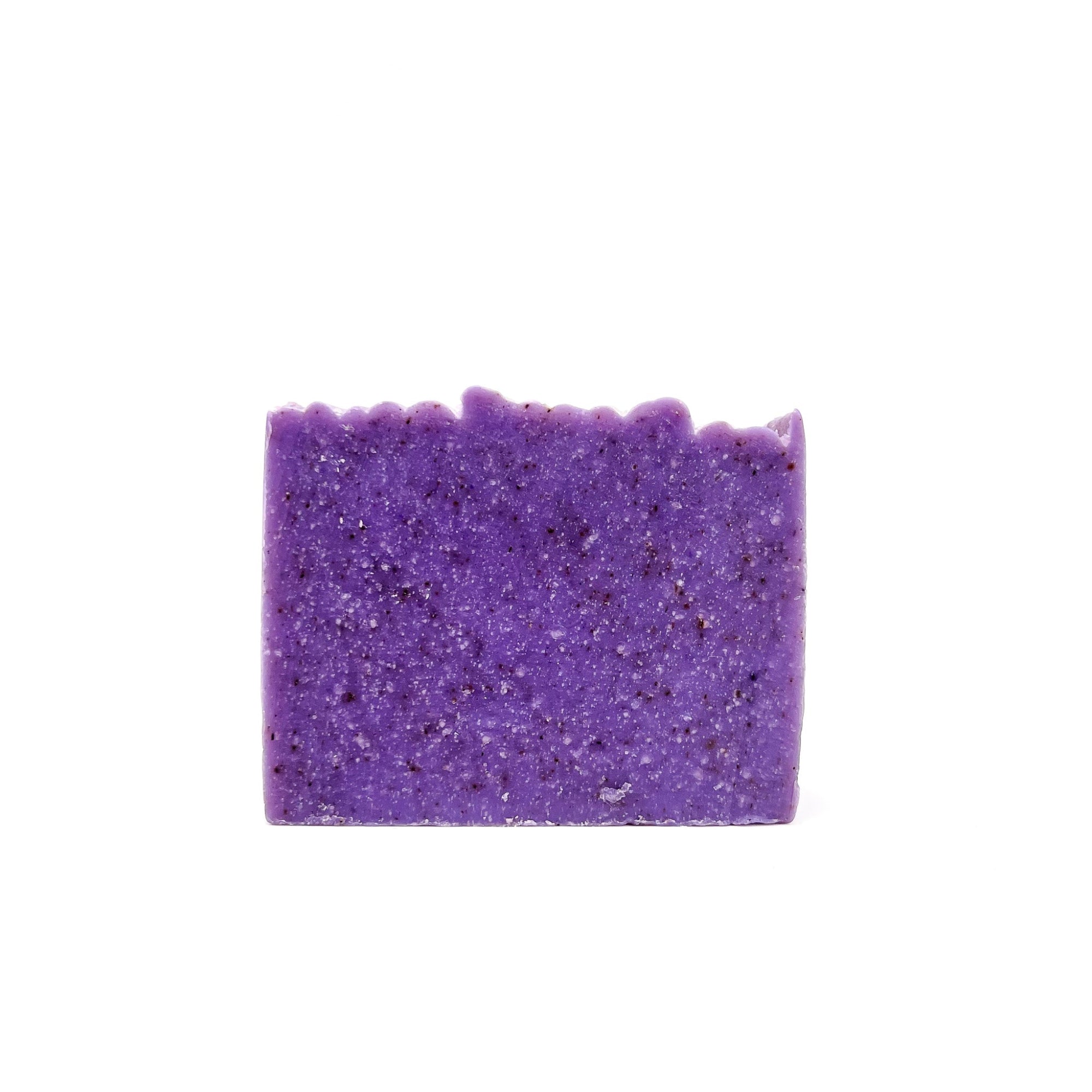 One bar of handmade lilac purple cold process soap from Rusted Acre Soap Company.