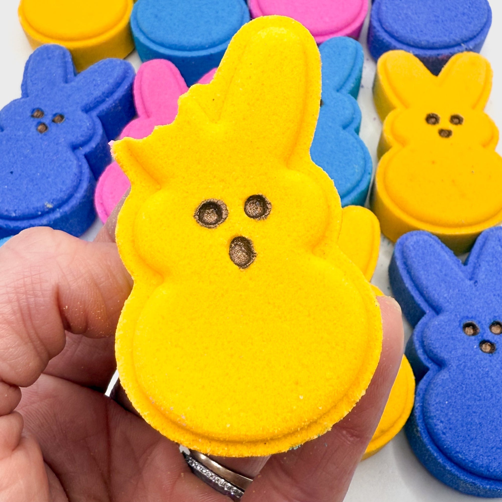 Yellow bitten bunny bath bomb made by Rusted Acre Soap Company 