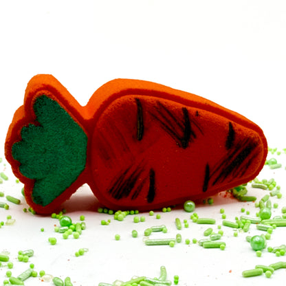 One orange carrot shaped bath bomb. Hand-painted green top and stripes. 