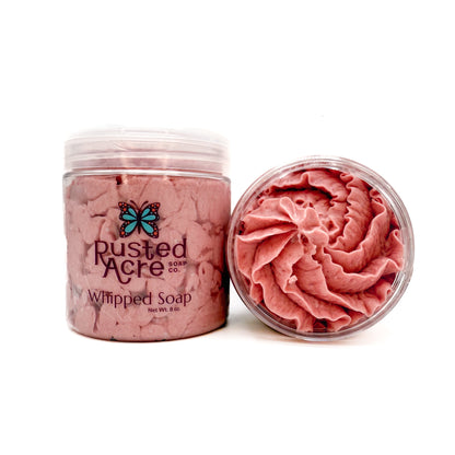 Two jars of Rusted Acre Soap Company’s cherry almond whipped soap front and top view. 