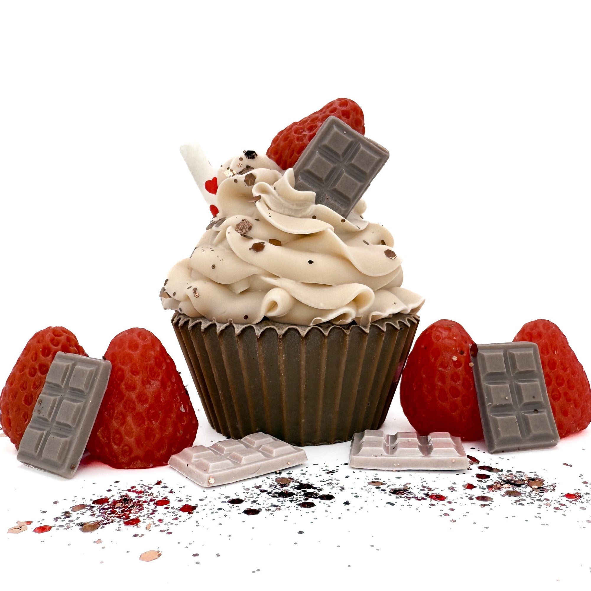 One cupcake shaped soap with brown cake and white icing. Topped with soap chocolate, red strawberry a paper straw and brown sprinkles.