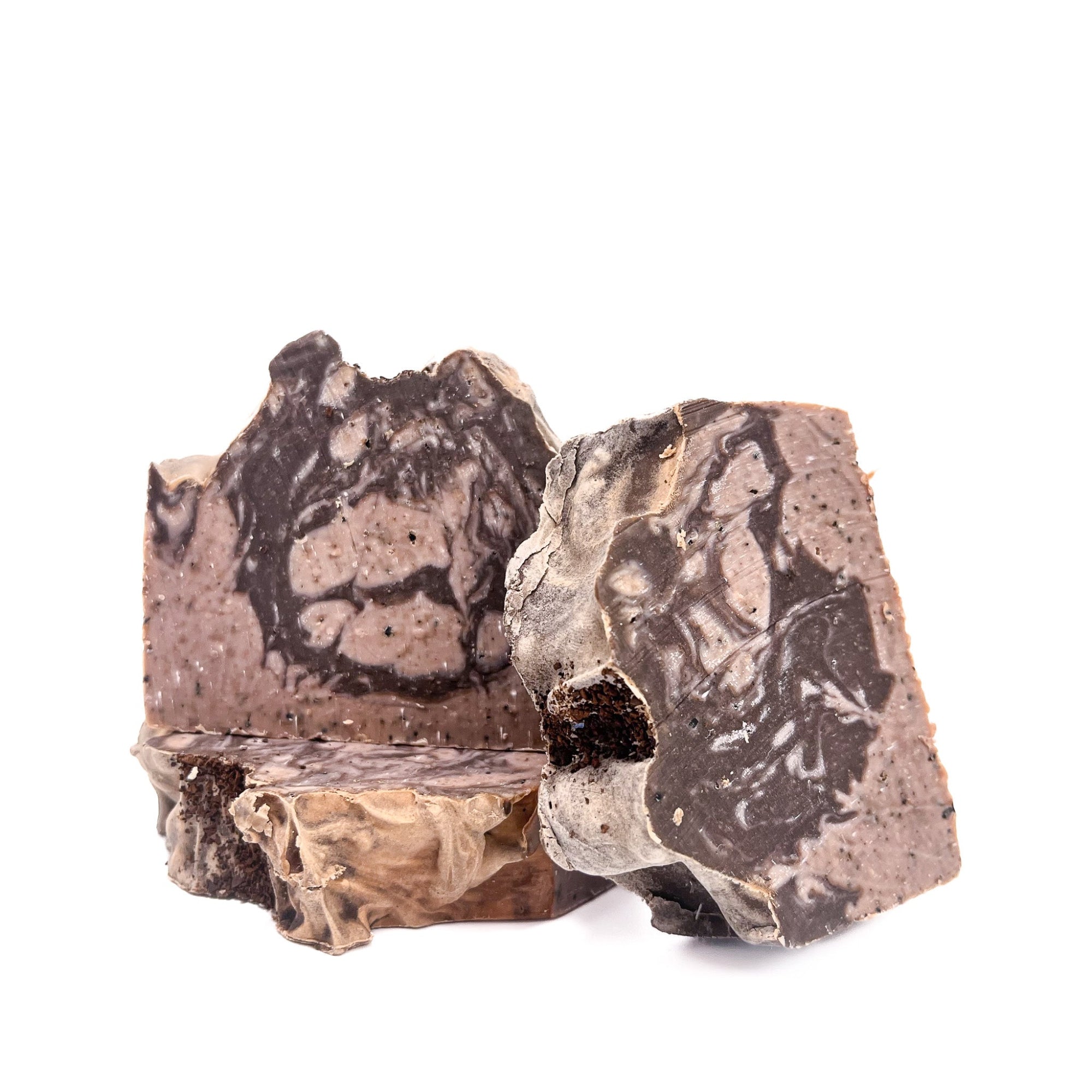 Three bars of Rusted Acre Soap Company's coffee handmade soap. Swirled brown and tan!