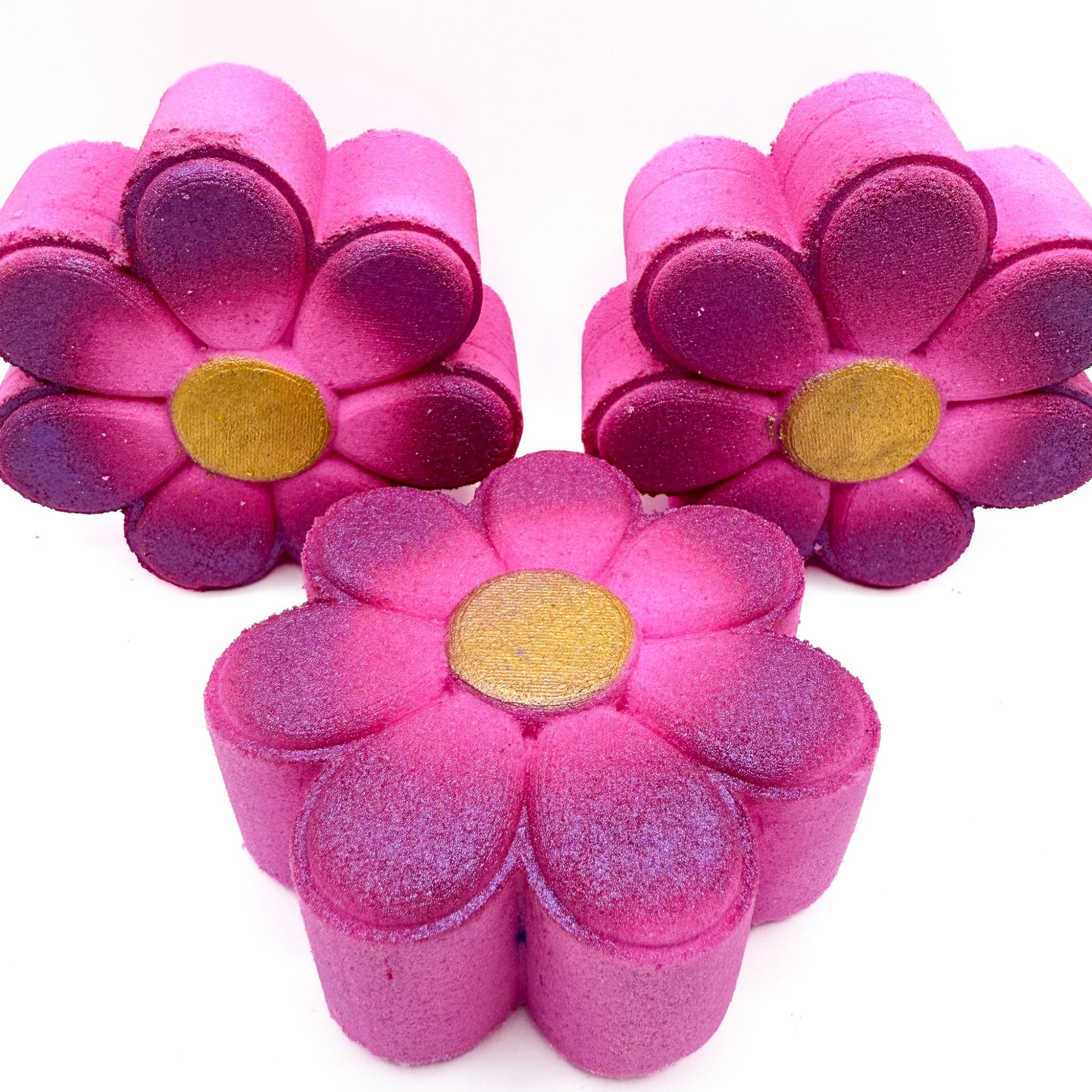 Top and side view of Rusted Acre Soap Companies daisy bath bombs. 