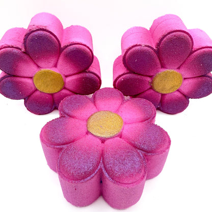 Top and side view of Rusted Acre Soap Companies daisy bath bombs. 