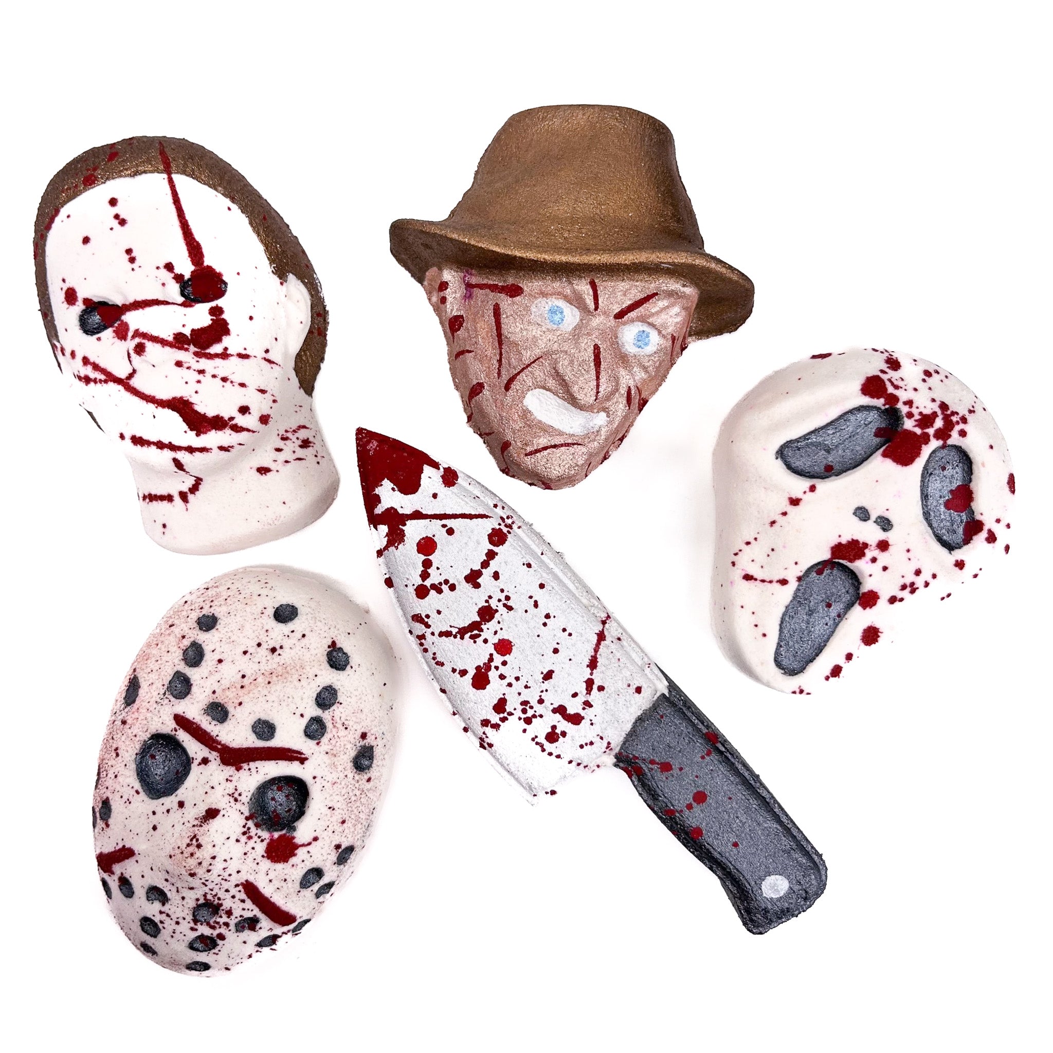 Four horror bath bombs and one knife bath bomb. All splattered with red mica like blood! Made by Rusted Acre Soap Co.