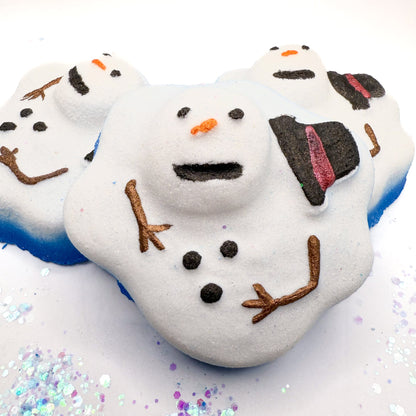 Melting Snowman themed bath bomb with decorative elements on a white background