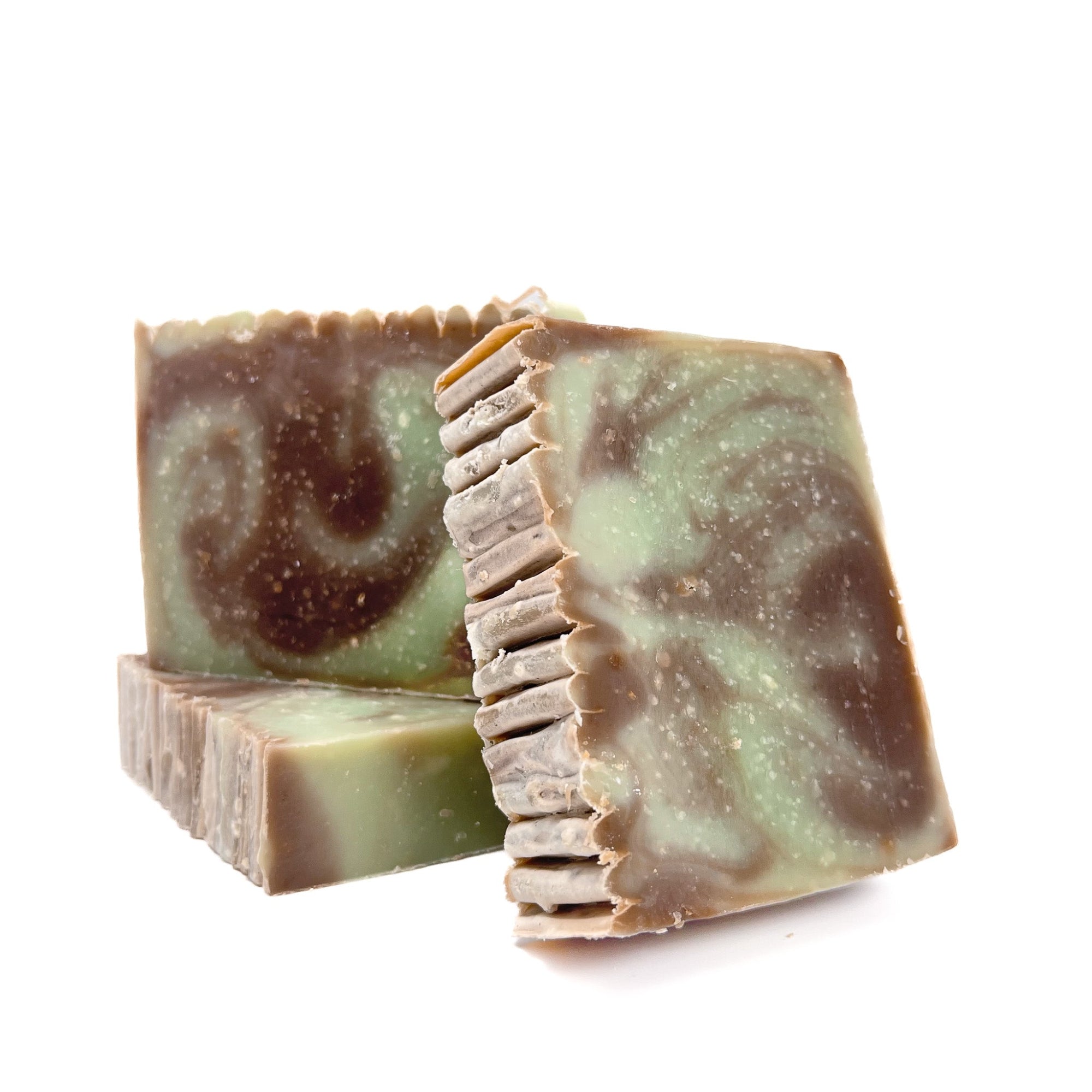 Three bars of mint chocolate handmade soap. Swirled with light mint green and chocolate brown.