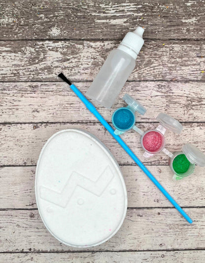 Paint your own easter egg kit with a chevron design, white bath bomb and painting supplies. Made by Rusted Acre Soap Co.