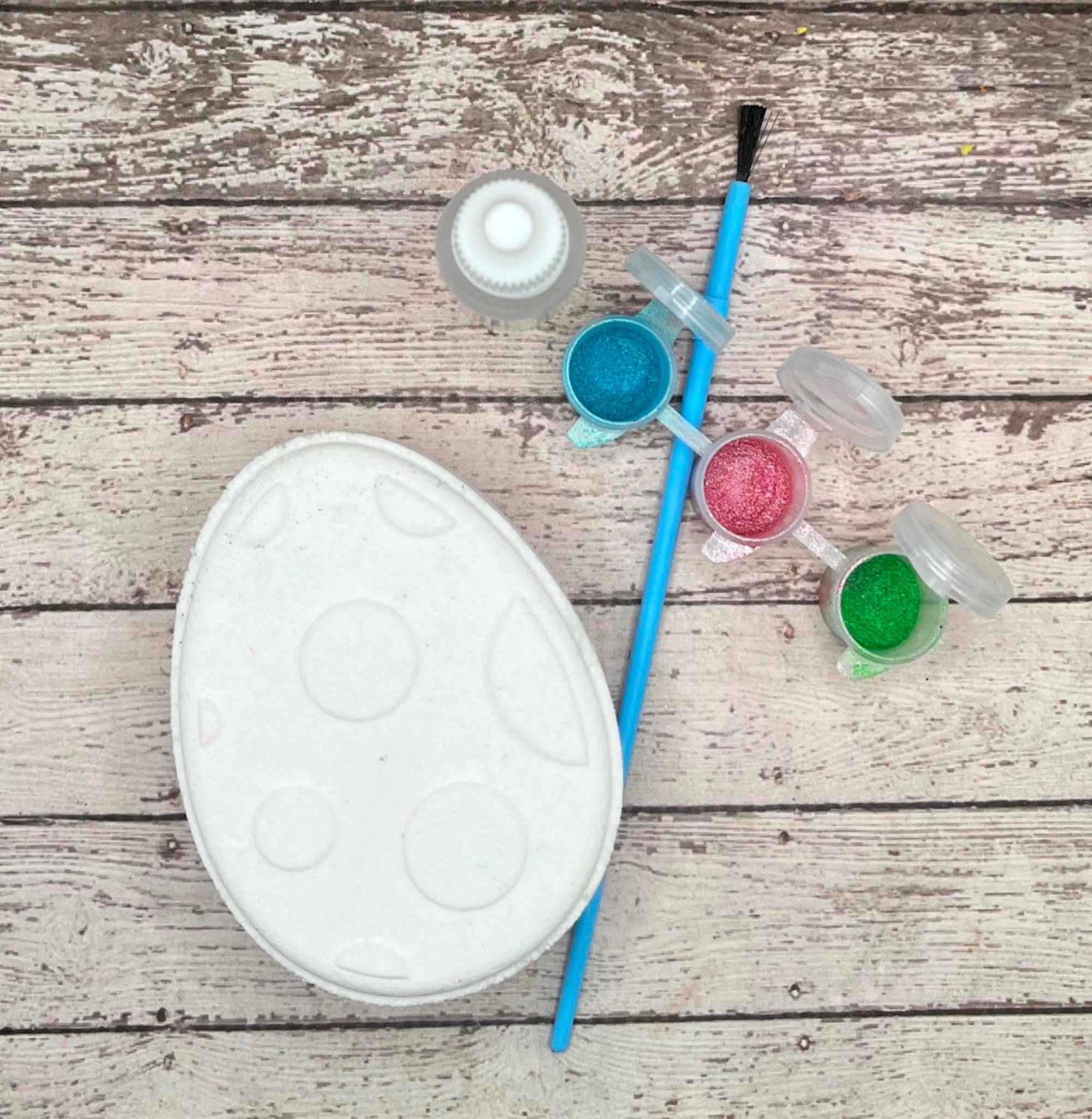 Paint your own easter egg kit with a dot design, white bath bomb and painting supplies. Made by Rusted Acre Soap Co.
