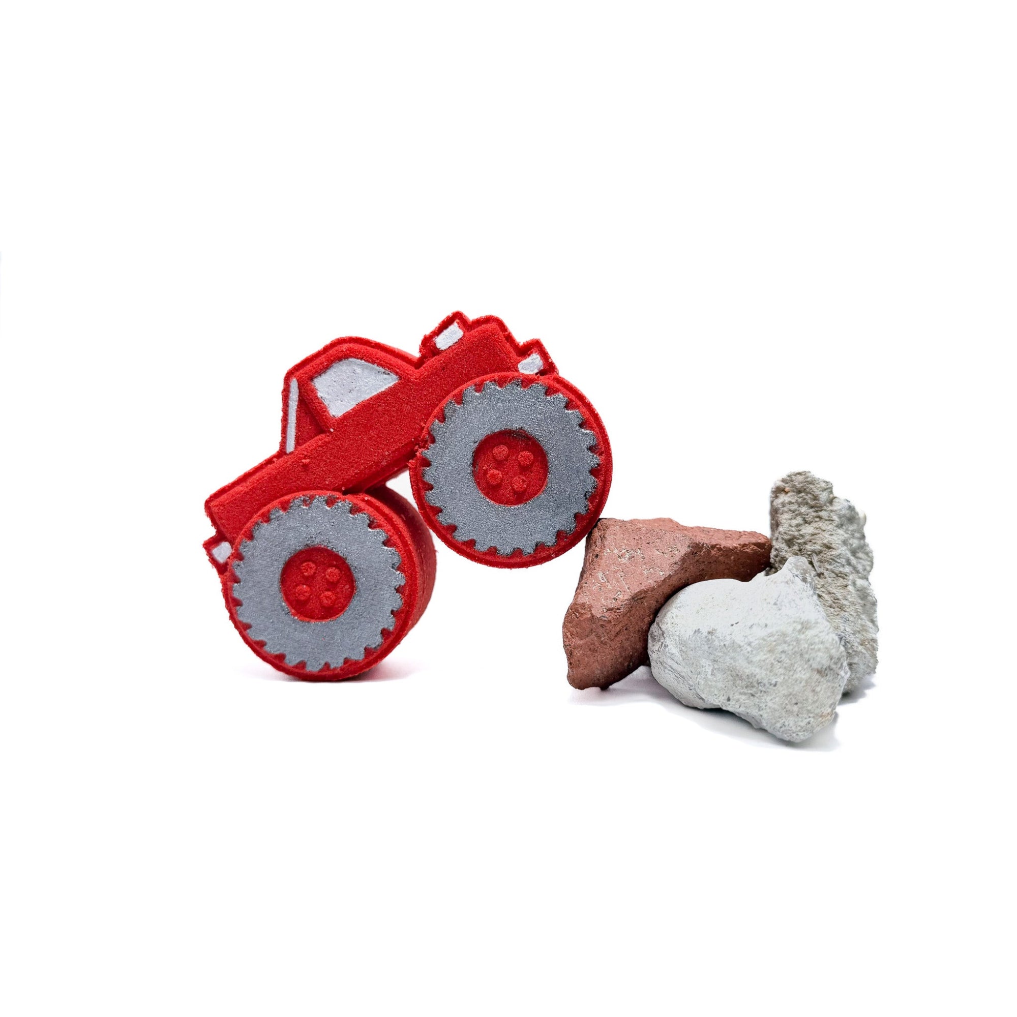 Red monster truck bath bomb handmade by Rusted Acre Soap Co