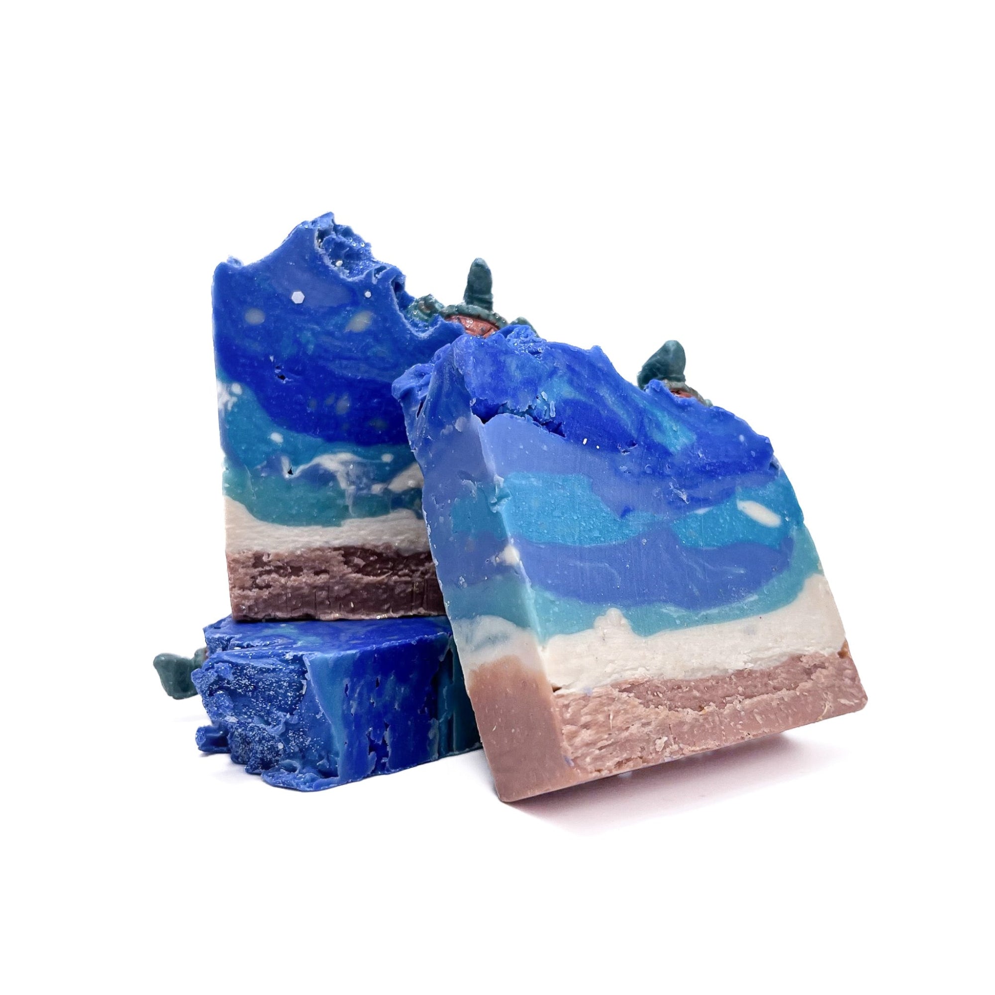 Three bars of Rusted Acre Soap Company's Sea Turtle handmade soap. 