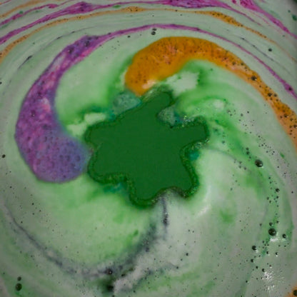 Rusted Acre Soap Companies Shamrock bath bomb putting on a color show.