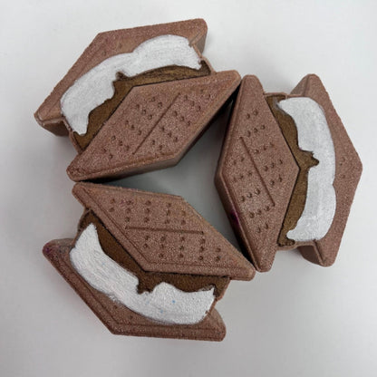Three hand painted smores bath bombs.