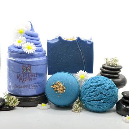 Full set of tranquility bath products made by Rusted Acre Soap Company. Pictured is Blue whipped soap, blue bath bomb, blue bar soap, blue bubble scoop. 