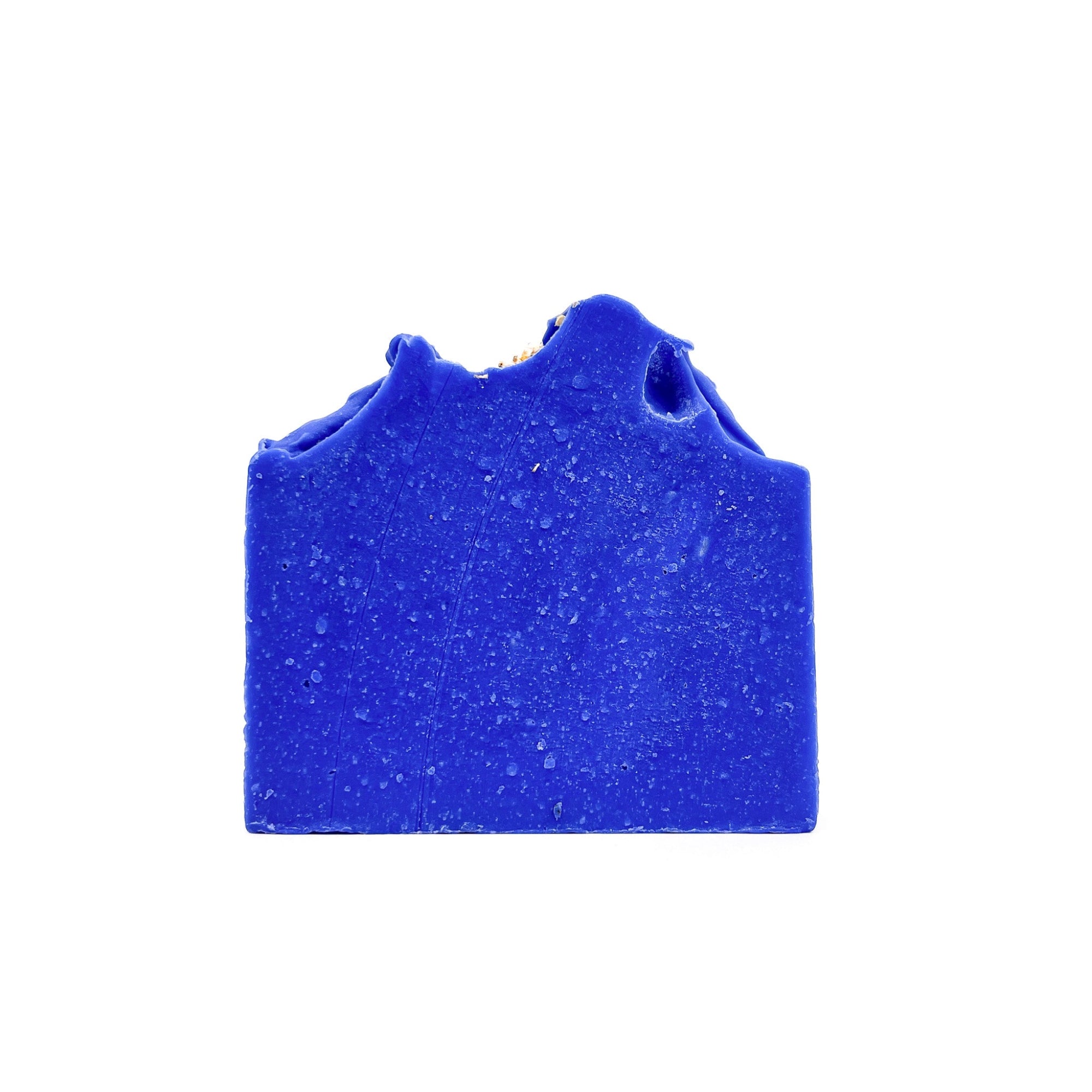 A bar of beautiful indigo blue handmade soap from Rusted Acre Soap Co. Tranquility scent.