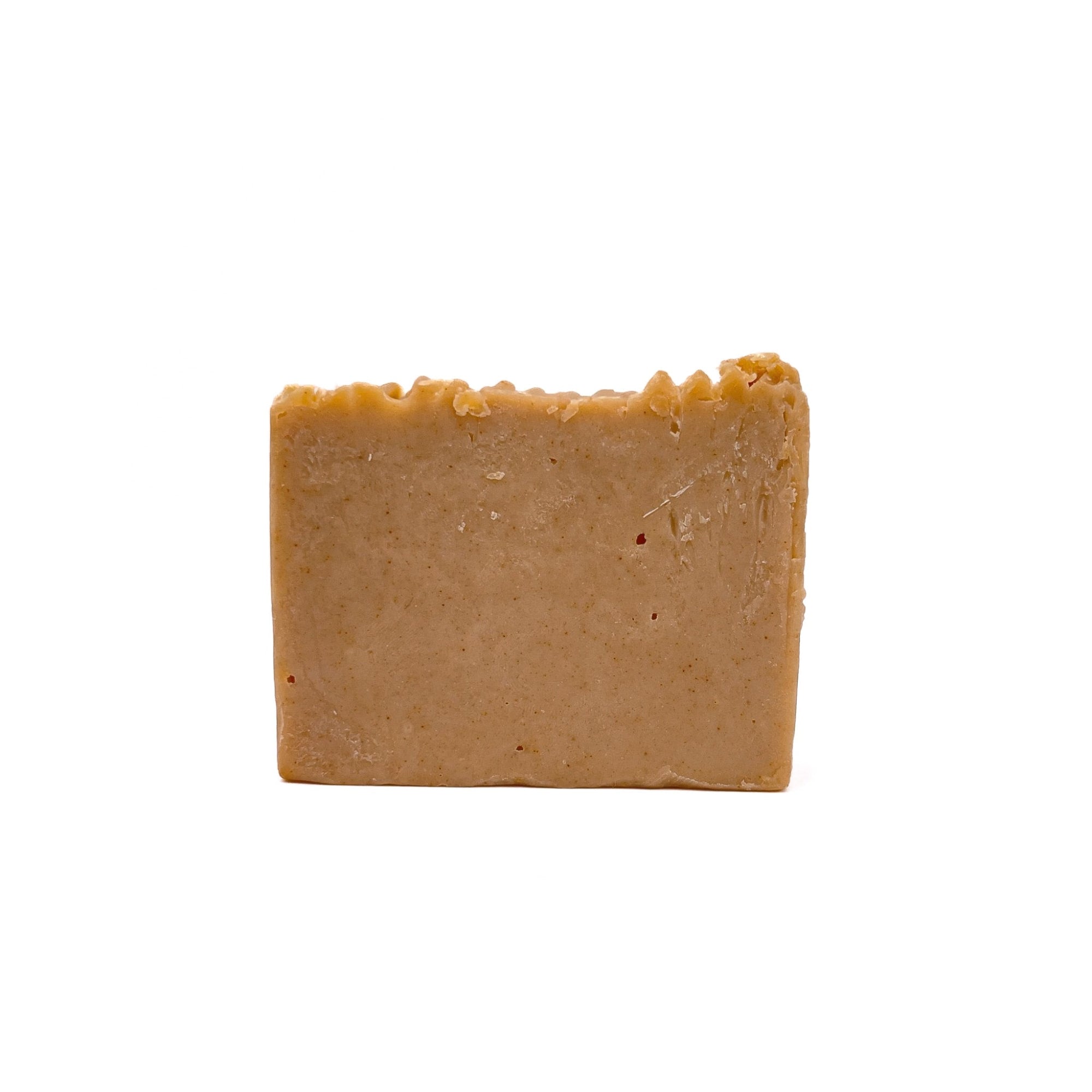One bar of creamy yellow colored handmade soap from Rusted Acre Soap Co.