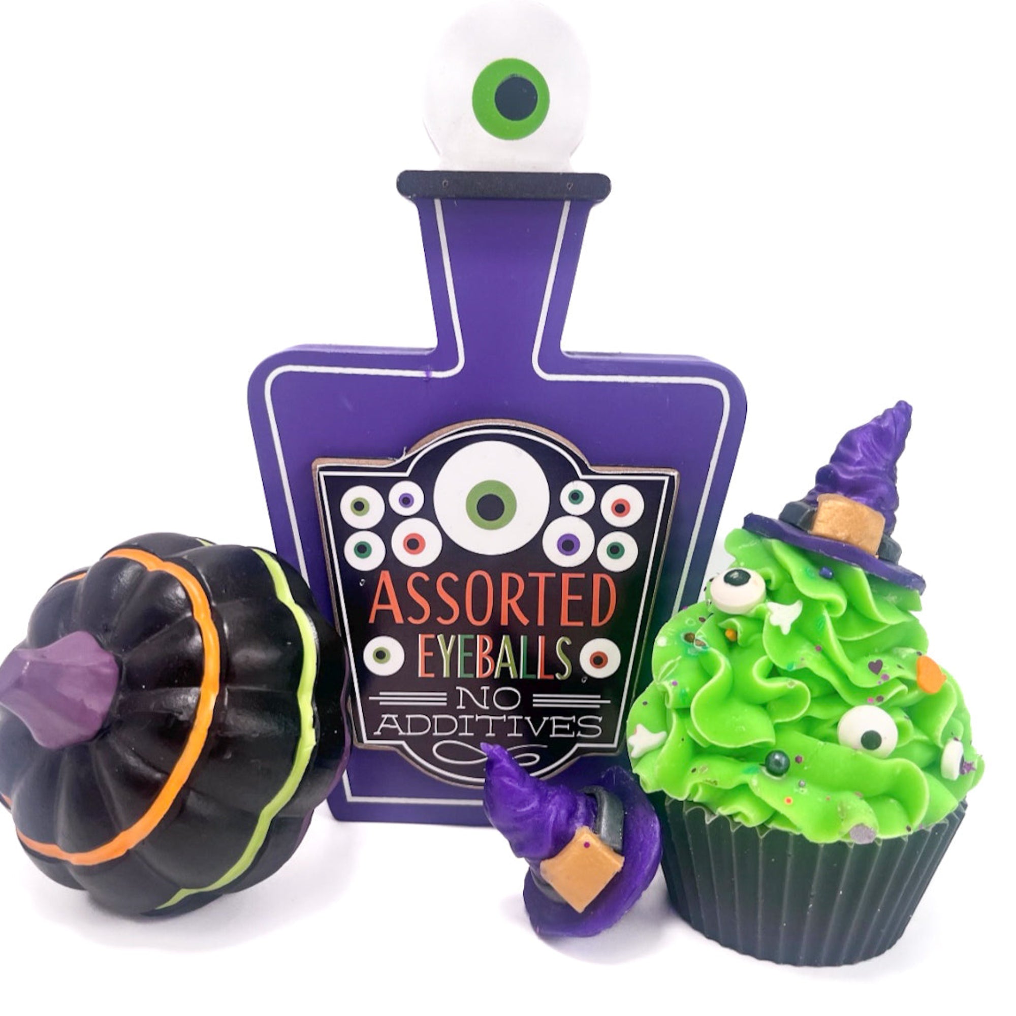 Halloween-themed cupcake soap with a purple bottle labeled 'Assorted Eyeballs No Additives decoration. 
