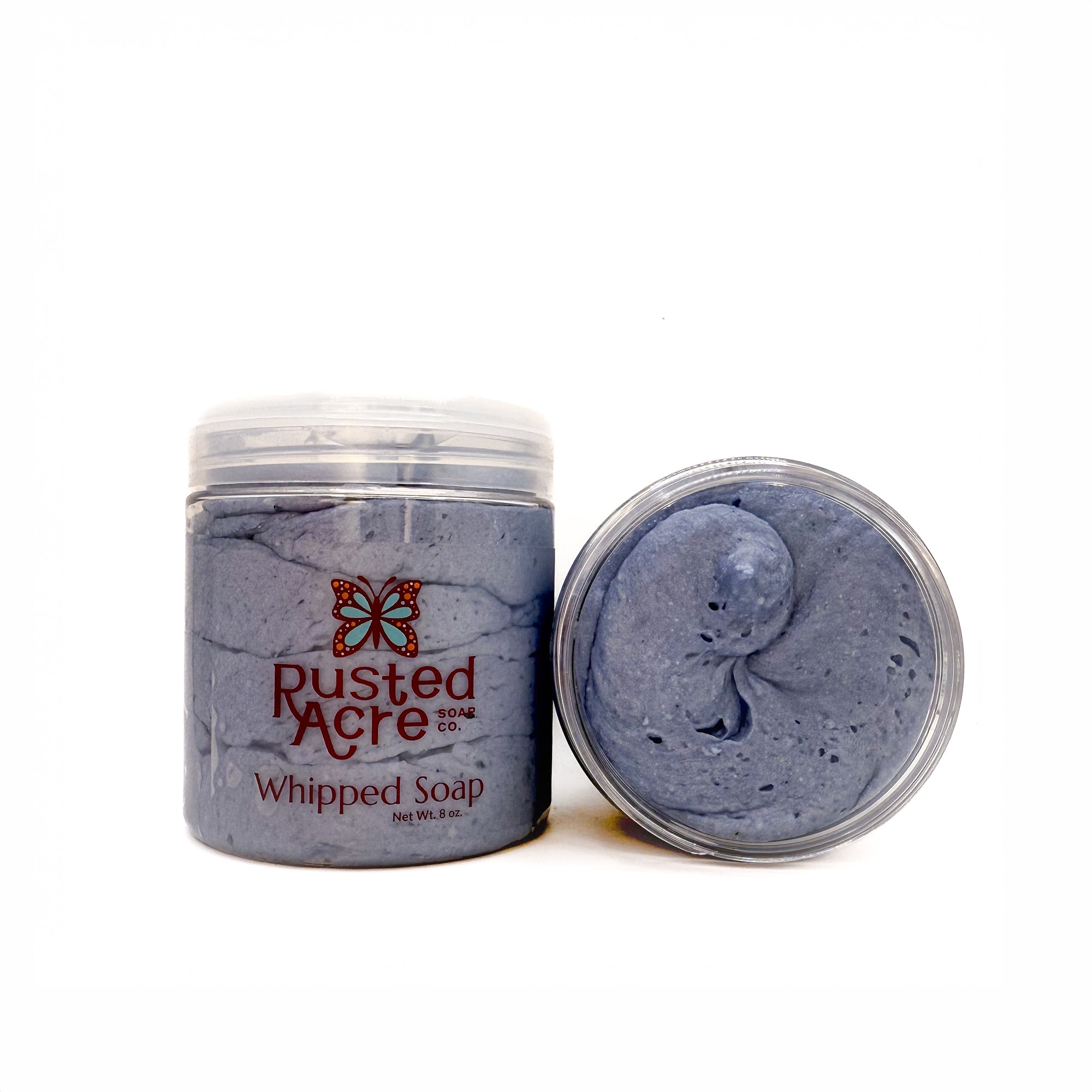 A flip top jar of light blue Zephyr Whipped Soap handmade by Rusted Acre Soap Co. 